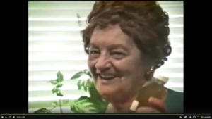 RENE CAISSE SMILING DURING AN INTERVIEW FROM A VIDEO DOCUMENTARY